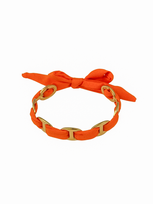 Manchette doré avec un tissu orange